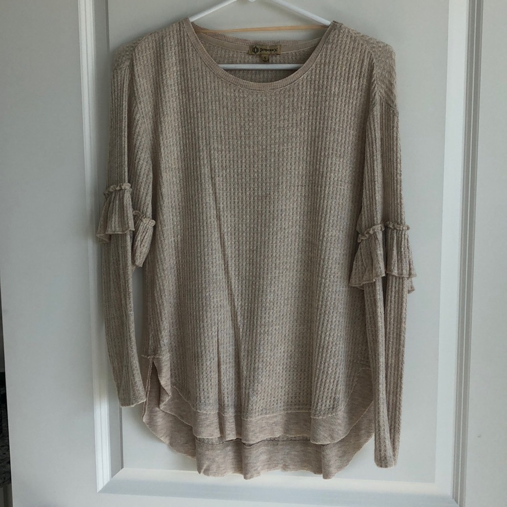 Long sleeved Henley with ruffle detail